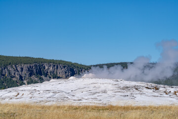 Old Faithful is a cone geyser in Yellowstone National Park in Wyoming, United States. Hydrothermal System. The Yellowstone Caldera / Yellowstone Plateau Volcanic Field. Yellowstone hotspot. 