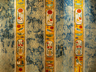 VALLEY OF THE KINGS, EGYPT : Interior of a tomb in the Valley of the Kings, featuring intricate wall paintings and hieroglyphs that tell stories of ancient Egyptian pharaohs.