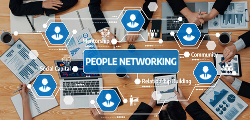 A dynamic networking session illustrating collaboration among professionals focused on relationship building, mentorship, and social capital in a modern office environment. Amity