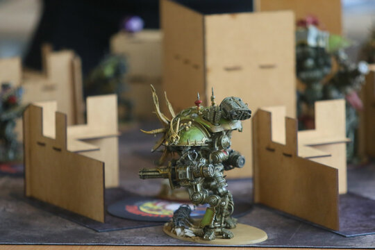 DAUGAVPILS, LATVIA - SEPTEMBER 28, 2025: Tournament Golden Urn. Warhammer 40k game in progress, close view