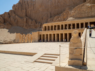 LUXOR, EGYPT : The Mortuary Temple of Hatshepsut at Valley of the Queens, an impressive ancient Egyptian monument built into limestone cliffs, visited by travelers from around the world.