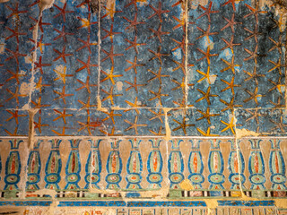 LUXOR, EGYPT : The Mortuary Temple of Hatshepsut at Valley of the Queens, an impressive ancient Egyptian monument built into limestone cliffs, visited by travelers from around the world.