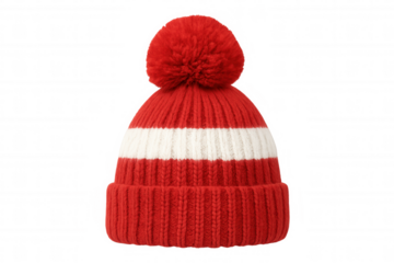 Red knitted pom-pom beanie with white stripe. Winter wool hat for cold weather and fashion