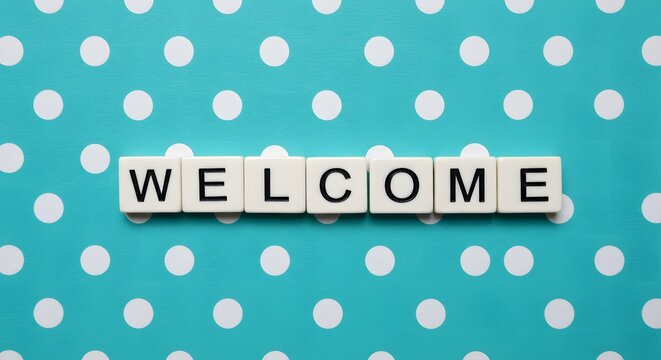 WELCOME Word Spelled Out with Scrabble Tiles on a Teal Polka Dot Background