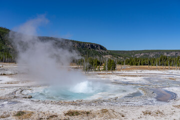 Black Sand Basin is one of a grouping of geothermal hot springs and geysers. Upper Geyser Basin, Yellowstone National Park, Wyoming. Hydrothermal System. hot-spring deposits. Extremophile. 
