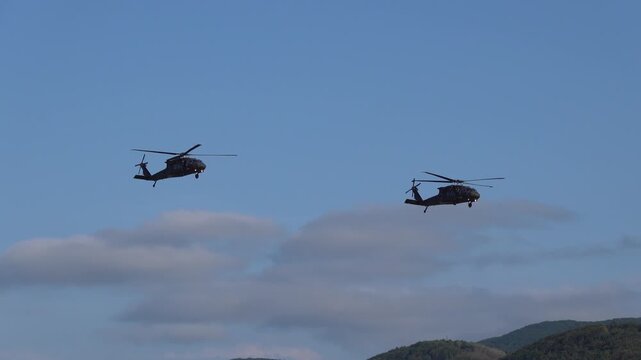 Military helicopter UH-60 in flight