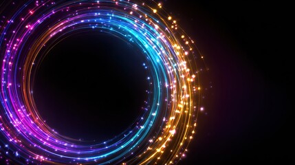 Bright, colorful light trails spiral outwards in a concentric pattern against a deep black background, with particles