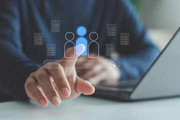 Businessman using laptop with virtual icons of resume documents and search bar, symbolizing recruitment, job search, talent acquisition, candidate selection and digital hiring process.