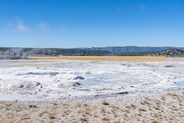 Fountain Geyser. Fountain Paint Pot Trail. Lower Geyser Basin in Yellowstone National Park. Hydrothermal System. hot-spring deposits. 
