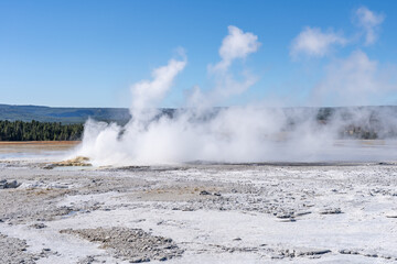 Clepsydra Geyser. Fountain Paint Pot Trail. Lower Geyser Basin in Yellowstone National Park. Hydrothermal System. hot-spring deposits. Extremophile. 
