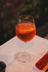 A Refreshing Cocktail with a Bright Citrus Garnish Beautifully Arranged on a Table