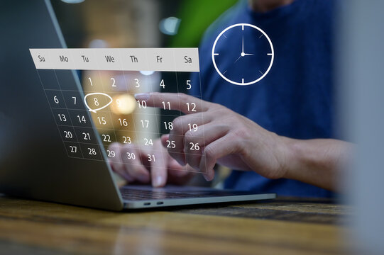 Person using laptop with digital calendar and clock interface for scheduling and time management symbolizing online scheduling, time management, productivity, planning, and digital organization