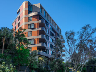 Residential and commercial Apartment building in inner west Sydney suburb , Sydney NSW Australia. Newly built apartment building in Wentworth point with modern Green eco friendly design