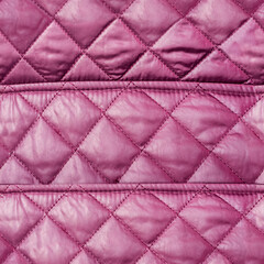 Seamless 4k photo texture of purple colored stitched bologna material.