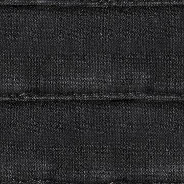 Seamless 4k photo texture of black colored cotton cloth material with stitches.