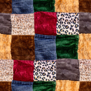 Seamless 4k photo texture of patchwork material with various square patterned pieces sewn together.