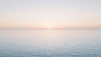 Obraz premium Sunset over calm sea