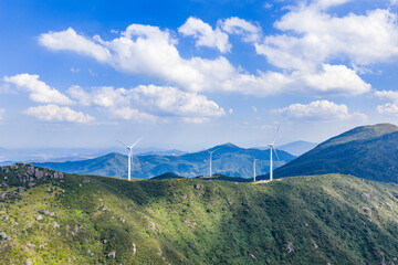 Wind power generation and windmills on a mountain.