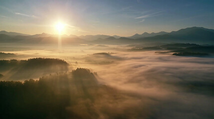 Sunrise over mountain peaks, mist rolling through valleys, cinematic landscape.