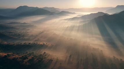 Sunrise over mountain peaks, mist rolling through valleys, cinematic landscape.