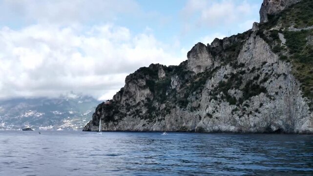 scenic amalfi coast with boats and mountain landsc