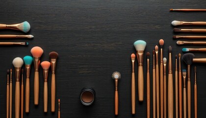 Collection of assorted cosmetic applicator tools, brushes, and container organized on dark textured background create a refined and minimalist aesthetic