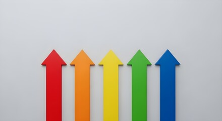 Colorful upward arrows arranged in a neat row on a plain background.