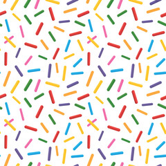 Vibrant seamless pattern of colorful crayon sticks scattered on