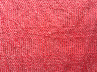 red knitted fabric texture. background