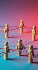 Obraz premium Interconnected Network: Wooden figures represent a connected network with threads, symbolizing a web of relationships. The color gradients of the lighting create depth. 