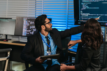 Software Developers Discussing Code