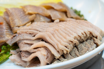 boiled pork slices with fermented skate in Samhap Cuisine