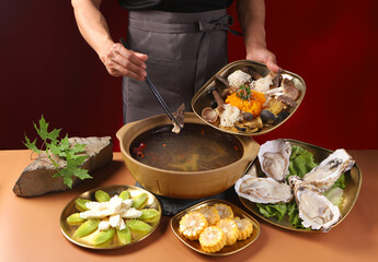 Traditional Chinese seafood hot pot, hot and sour flavor