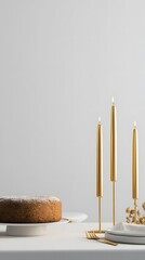 Elegant birthday celebration with cake and candles minimalist setting artistic display