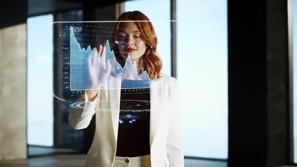 Professional businesswoman analyzing futuristic holographic financial data charts and growth trends in a modern office setting - Powered by Adobe