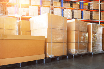 Bulk of Package Boxes Wrapped Plastic on Pallets. Cartons, Cardboard Boxes. Storage Warehouse. Supply Chain, Supplies Goods Shipment. Shipping Warehouse Logistics.	
