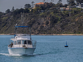 Obraz premium Incoming Fishing Charter In Calm Seas