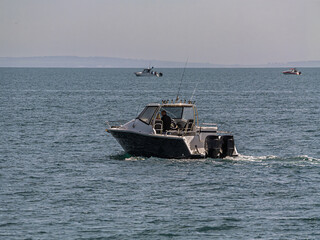 Medium Cruiser Slowly Cruising In Calm Seas