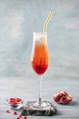 Summer alcohol drink pomegranate Tintoretto  in flute glasses. Brunch cocktail