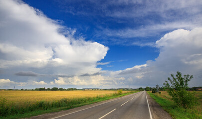 Road with a clear blue sky above it