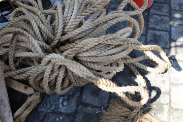 Bunch of rope is laying on the ground