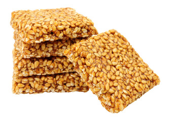 Group of sesame seed chikki traditional Indian sweet snacks isolated on a white background