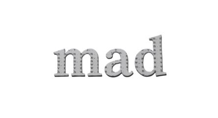 Word mad cut from paper with a texture of printed text, on white background.