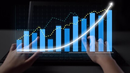Close-up of hands working on a digital screen displaying stock market data with graphs and indicators, representing growth, analysis, and financial trends in a modern workspace. Copula - Powered by Adobe
