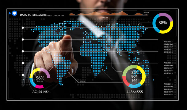 Businessman Interacting with Digital Data Visualization on Screen Featuring World Map and Statistical Charts in a Modern Office Environment