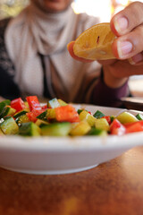Fresh vegetable salad with lemon at a local restaurant