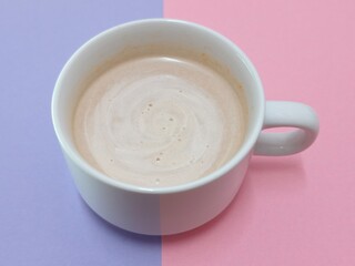 Malaysian Teh Tarik or Hot Milky Drink Served in a Traditional Cup. Mug of Frothy Hot Drink with Subtle Foam Texture