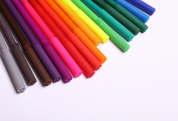 Set of colored pencils on a white background