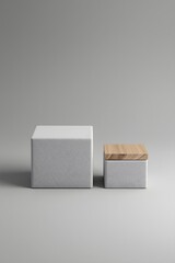 Two minimalist storage boxes made of concrete with wooden lids on a neutral gray background, showcasing modern home organization, Scandinavian design, and stylish interior decor aesthetics.