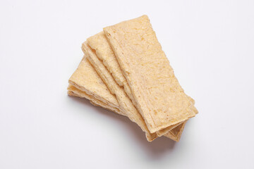 Diet whole grain bread crispy crackers on white background